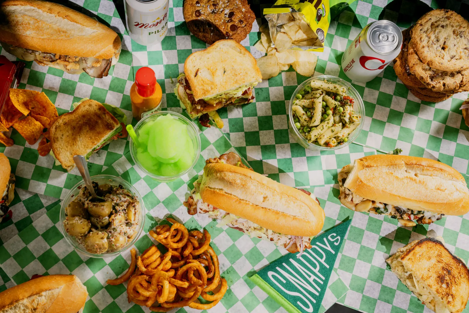 Snappy’s catering spread with sandwiches and sides